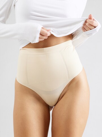 Dorina String i beige: framsida