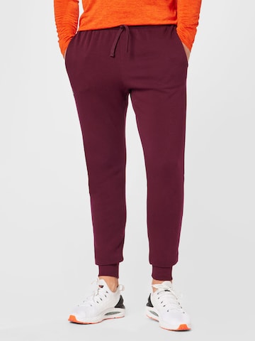 UNDER ARMOUR Tapered Sports trousers 'Rival' in Red: front