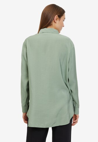 Cartoon - Blusa en verde