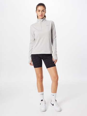 NIKE - Camiseta funcional 'PACER' en gris