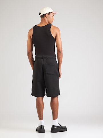 WEEKDAY Loose fit Trousers in Black