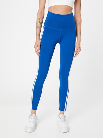 Reebok - Skinny Calças de desporto em azul: frente