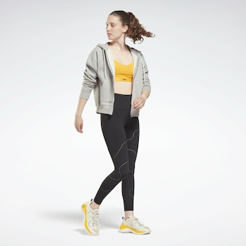 Bustino Reggiseno sportivo di Reebok in giallo