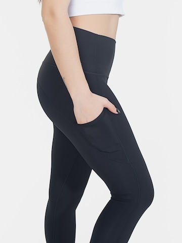 Skinny Pantaloni sportivi di Spyder in nero