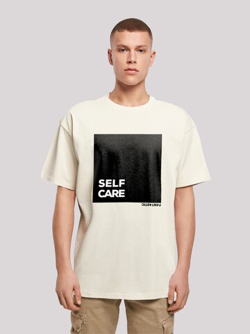 T-Shirt 'SELF CARE' F4NT4STIC en beige : devant