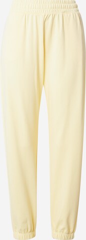 Champion Authentic Athletic Apparel Pants in Yellow: front