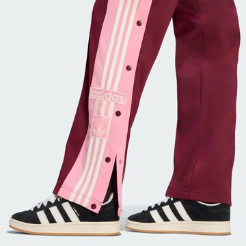 ADIDAS ORIGINALSLoosefit Hlače 'Adibreak' - crvena boja