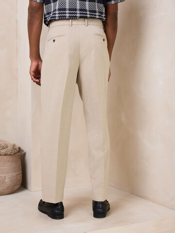 Loosefit Pantaloni con piega frontale di Next in grigio