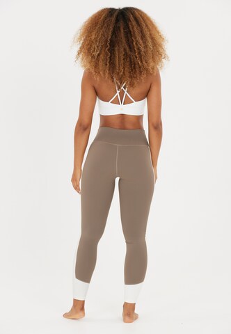 Athlecia Skinny Sports trousers 'Lris' in Brown