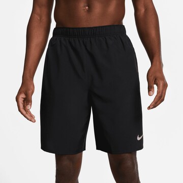 NIKE Regular Workout Pants in Black