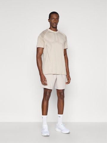 NIKE regular Παντελόνι φόρμας 'CHALLENGER' σε ροζ