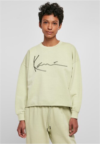 Sweat-shirt Karl Kani en vert : devant