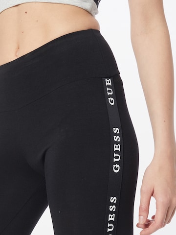 GUESS Skinny Sportovní kalhoty 'ALINE' – černá