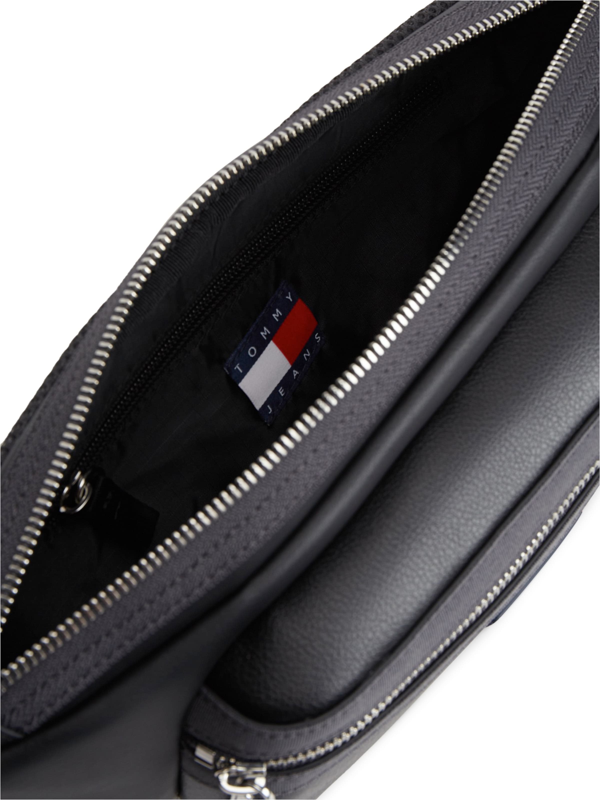 Tommy Jeans Olkalaukku 'ELEVATED' värissä musta