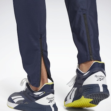 Reebok Tapered Workout Pants in Blue