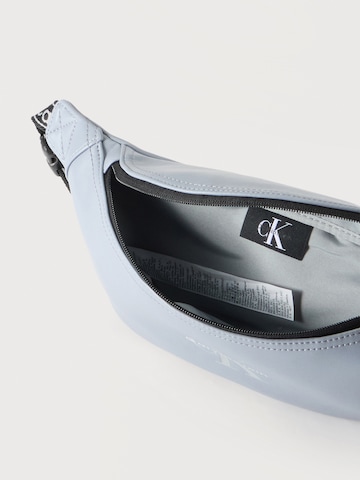 mėlyna Calvin Klein Rankinė ant juosmens