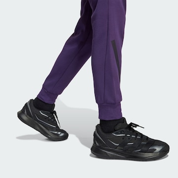 ADIDAS SPORTSWEAR Tapered Sports trousers 'Z.N.E.' in Purple