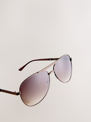 Lunettes de soleil Next en bronze