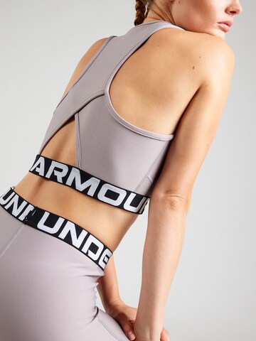 Top sportivo 'HeatGear' di UNDER ARMOUR in grigio
