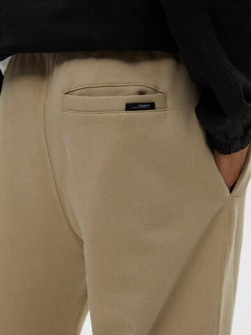 Pull&Bear Zwężany krój Spodnie w kolorze beżowy