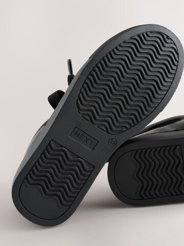 Baskets Next en noir