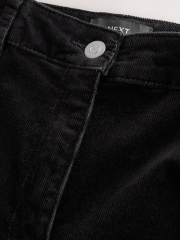 Skinny Pantaloni di Next in nero
