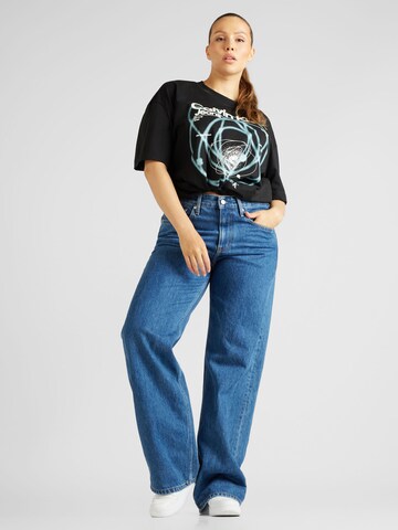 T-shirt 'Galaxy' Calvin Klein Jeans Curve en noir