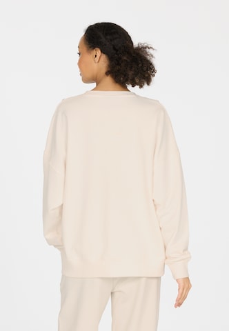 Athlecia Sports sweatshirt in Beige