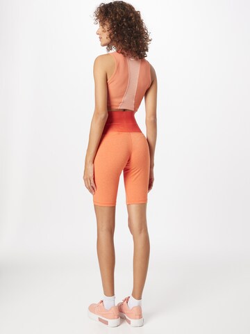 Skinny Leggings 'CIRCA' di Nike Sportswear in arancione