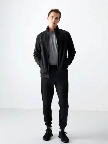 Tuta da jogging di Tommy Life in nero: frontale