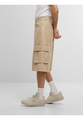 Loosefit Pantalon Karl Kani en beige