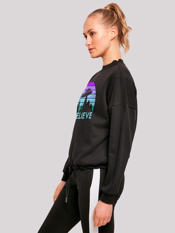 Sweat-shirt 'I believe UFO Alien Raumschiff Retro' F4NT4STIC en noir