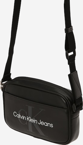 Calvin Klein Jeans monogram cross body bag in black