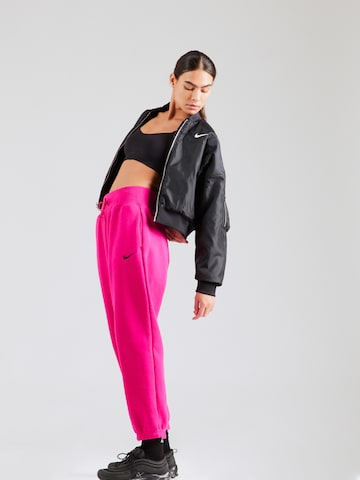 rozā Nike Sportswear Pakapēniski sašaurināts piegriezums Bikses 'PHOENIX FLEECE'