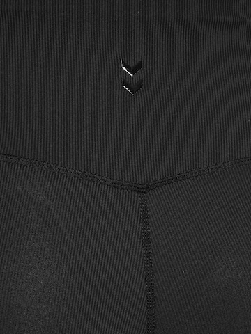 évasé Pantalon de sport Hummel en noir