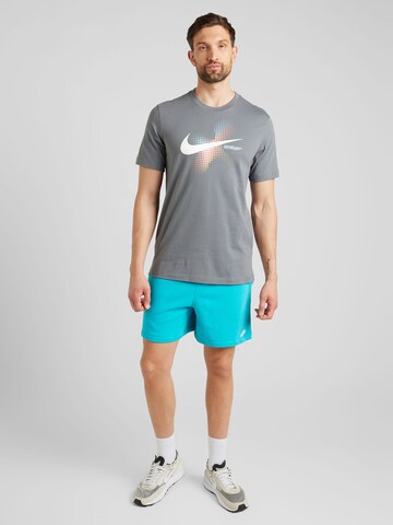 Nike Sportswear T-Shirt 'SWOOSH' in Grau