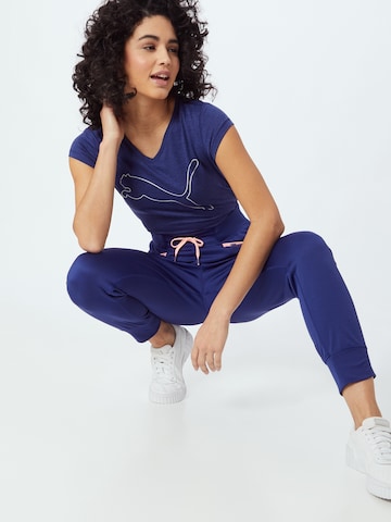 Effilé Pantalon de sport PUMA en bleu