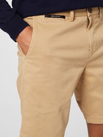 Regular Pantalon chino Superdry en beige