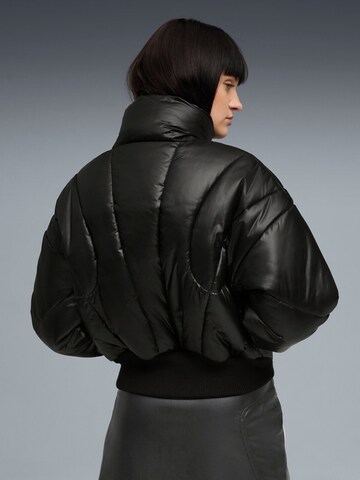 PUMA Tussenjas 'Puma Dare To Puffer Jacket' in Zwart