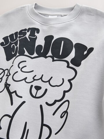 Next - Conjuntos em cinzento