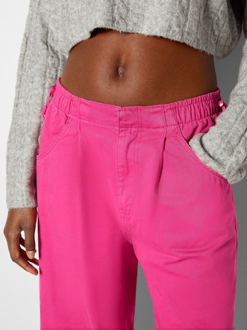 Bershka Wide leg Pleat-Front Pants in Pink