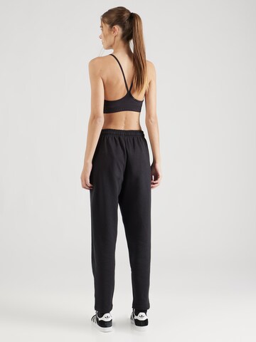 Regular Pantalon de sport Reebok en noir