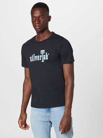 LEVI'S ® Regular T-shirt 'Graphic Crewneck Tee' i svart: framsida