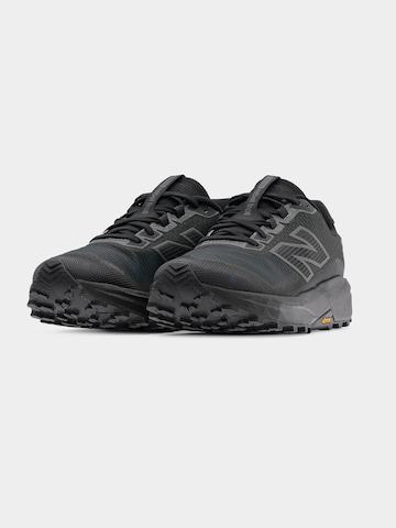 Chaussure de course 'Rebel Trail' new balance en noir