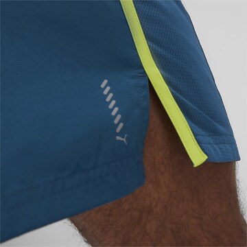 PUMA Regular Workout Pants 'Run Favourite Velocity 7' in Blue