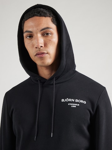 Hanorac sport 'ESSENTIAL 1' de la BJÖRN BORG pe negru