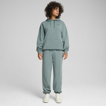 PUMA Tapered Sporthose in Grün