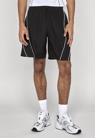 Regular Pantalon Urban Classics en noir : devant