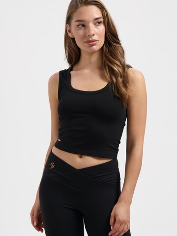 Urban Goddess Yoga & Activewear Sporttop 'Seris' in Schwarz: Vorderseite