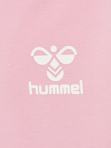 Hummel Collegetakki värissä vaaleanpunainen